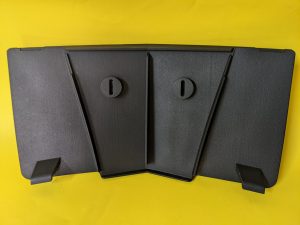 Rear view of the 3D printed Corvette plate holder, showing the precise mounting brackets created with Selective Laser Sintering (SLS).