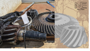 Damaged large industrial spiral bevel gears on a transport pallet, ready for 3D scanning by NE Solution.