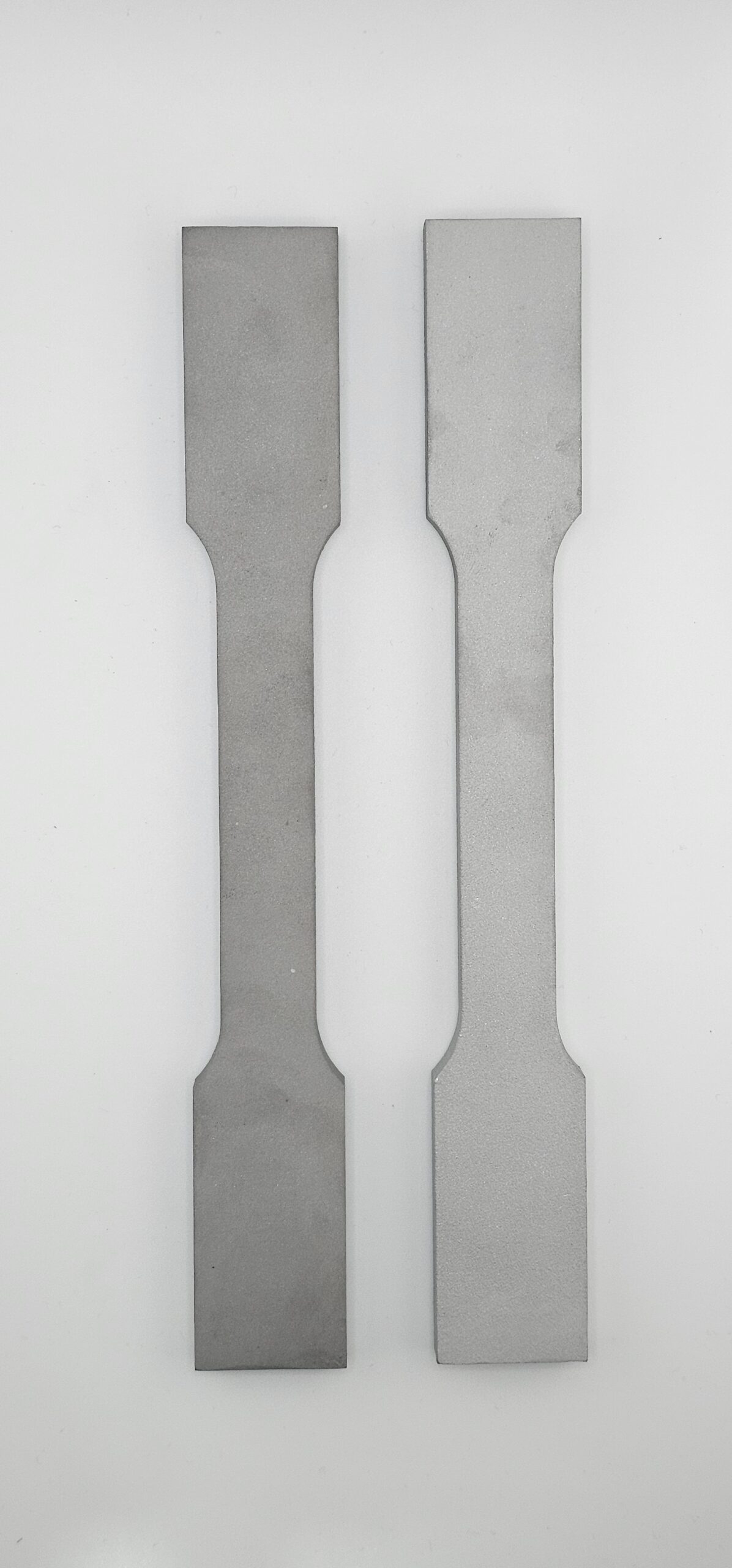 As-supplied dog-bone tensile specimens prior to testing